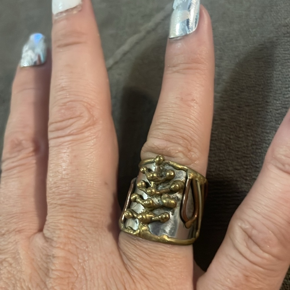 Silver brass ring design.